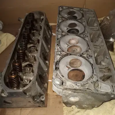 LS 317 cylinder heads in decent shape. One has a tiny crack but should still be usable. **money back...