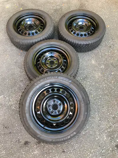 I am selling a set of four 225/55R17 = 225/50R18 Michelin X-ice Snow winter tires on Original Toyota...