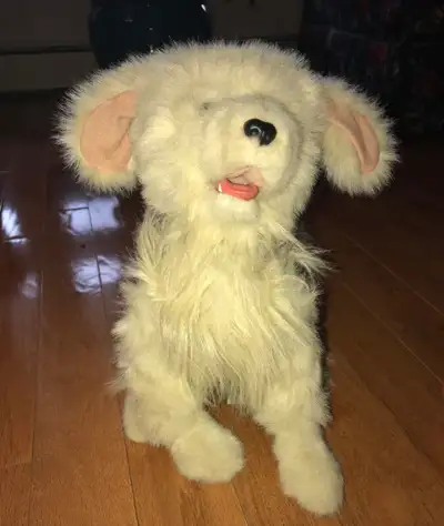 Cute 14 inch interactive puppy dog...Tested and working...moves heads, paw, etc...doesn't make a bar...