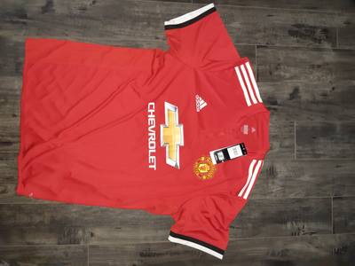 All are brand new and never-worn. Take all items for $105 or: - Jersey (large): $70 - Scarf: $25 - S...