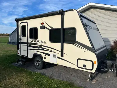 2016 Forest River Palomino Solaire 14 (18-feet). Two pop-out beds. Selling as is, some water damage...