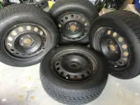 205/60R16 Uniroyal Tiger Paw snow tires & steel rims