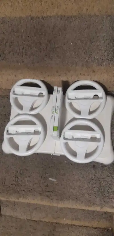 Get ready to rev your engines with this collection of Nintendo Wii accessories! This set includes a...
