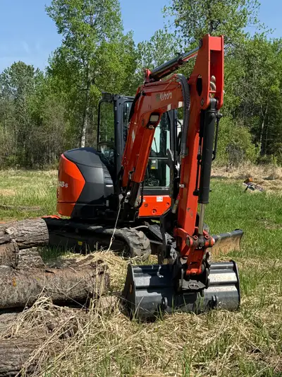 Like New 2024 Kubota U48-5 mini excavator with thumb, smooth bucket, and digging bucket. Ultra low h...