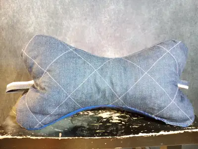 One of a kind neck pillow made from high quality selvedge denim (pink stripe), non toxic memory foam...