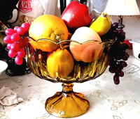 AMBER FOOTED GLASS VASE WITH PLASTIC FRUITS