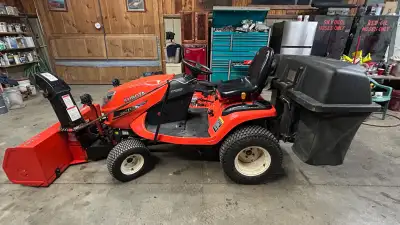 Kubota GR2110 tractor with 54" mid-mount mower deck and vacuum system and front mount snowblower.