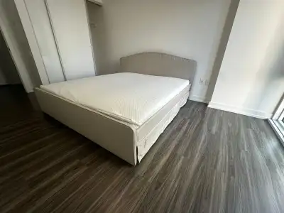 Selling my IKEA RAMNEFJÄLL upholstered bed frame in Kilanda light beige, including the IKEA LURÖY sl...