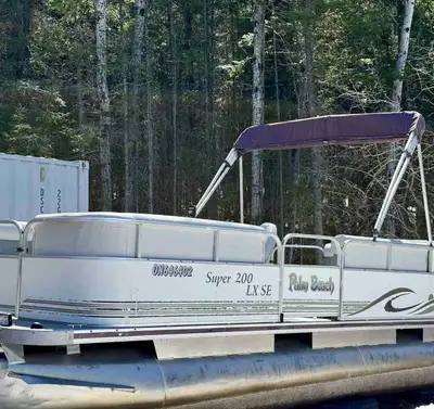 Palm Beach 21 foot pontoon with a 25 HP four stroke Mercury. New upholstery and flooring. There is a...