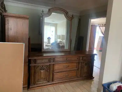 Beautiful real wood vanity (part of set with dresser). Lots of drawers and detachable mirror. Slight...