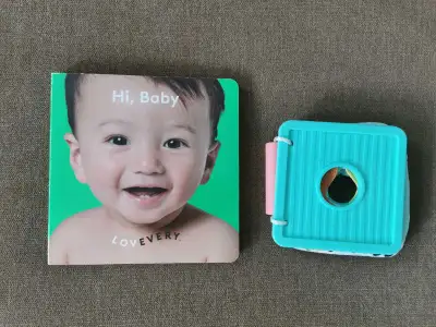 Pick up in West Springs SW. $25 for both books. 1. ‘Hi, Baby’ (The Senser Play Kit for Months 5–6) 2...