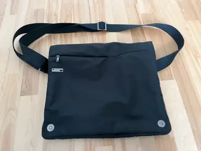 Super lightweight, stylish and practical LEXON TODAY adjustable messenger bag. Designed by M. Pulga...