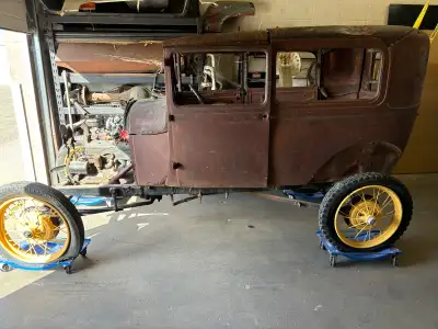 Sedan body with chassis, is mostly solid, cowl rust and other bumps with a few holes. Motor not runn...