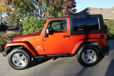 Pristine Jeep Wrangler JK for sale. The Jeep has been exceptionally well maintained, always garaged...