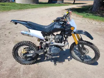 I am selling my used Evogue dirtbike, perfect for off-road adventures with its robust design and pow...