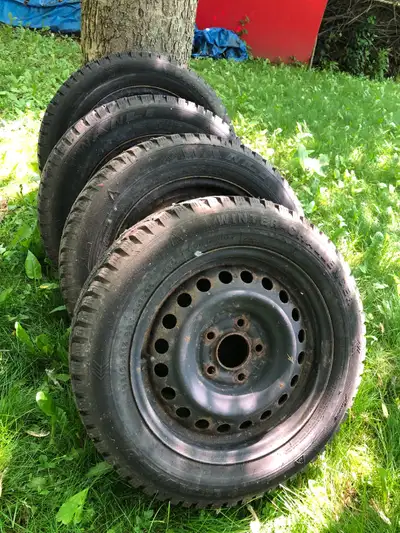 4 winter tires with rims in really good shape. They came off a Nissan Sentra.
