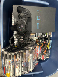 Ps2 with remote and about 100 games OBO