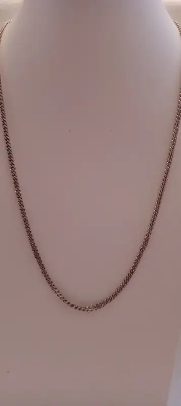 A FINE HEAVY DUTY 925 SOLID STELRING CHAIN WEIGHING 20.35GMS THIS CHAIN MILDY GOLD PALTED AND ALSO M...