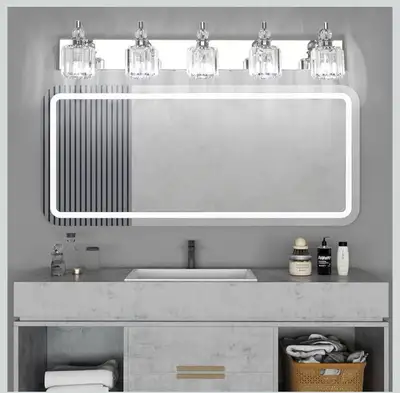 Brighten up your bathroom with this five-light vanity fixture, designed to cast a warm and inviting...