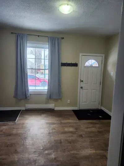 $1300+ Utilities (hydro + water), 3 bedroom 1.5 bath, in-suite laundry, close to Arlington on Alfred...