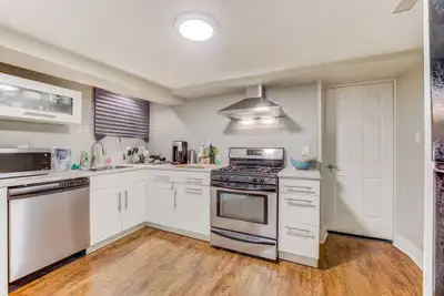 Spacious Furnished Bsmt with Private Entrance, Laundry & Utility