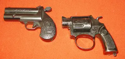 Vintage Lighter 2 Very Cool Items "Two Hand Guns" - both 3."x2" -One reads W 9999 / other shows two...