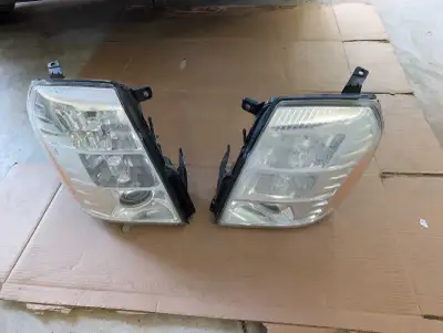 Cadillac Escalade base model headlights, View more