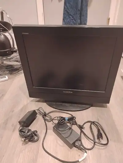 12 volt Rv LCD tv with dvd player that works, 2 different power supplies. One is 12 volt lighter, an...