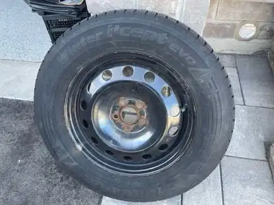 Hankook Winter I-cept Evo Tires Used Tread at 5.23 mm 16 inch steel rims Tire Size 235/60 r16 Set of...