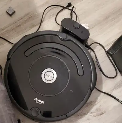 Cord has some cosmetic damage but it still charges well. Roomba and docking station work well. Don't...