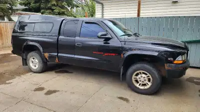 99 Dakota sport 4 x 4 , 5.2 L. Canopy is 81" long & in great shape, truck body not so much. Engine r...