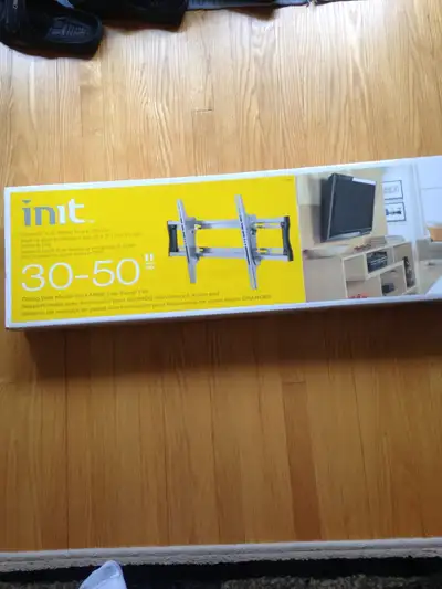 Selling a brand new Init tilting wall mount, designed for large flat panel TVs ranging from 30 to 50...