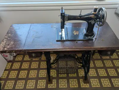 This vintage 1900’s Raymond treadle sewing machine could be a beautiful decorative piece or a fun re...