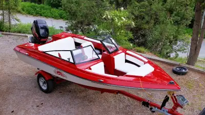 Boat is completely restored approximately $25 k cost - red /white paint, new carpet, new seat covers...