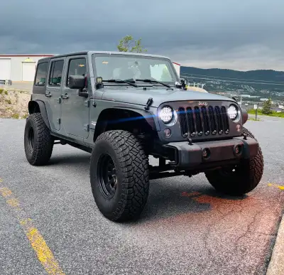 Up for grabs until storage next month! 2014 Jeep Wrangler Sahara Unlimited 6 Speed Manual 170,000km...