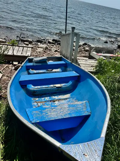 12 ft aluminum, good boat used it in the spring but I have no use for it anymore, asking 1,200 obo