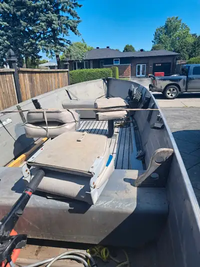 14 ft deep and wide with 15hp mercury 4 stroke, short shaft. Includes 2 oars, 4 life jackets, safety...