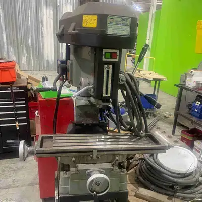 PDM-30 milling machine with a VFD drive to allow for variable speed. We installed a new 3 phase moto...