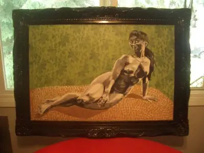 This Nude Woman on canvas is an original from a local artist. Also, the unique sculptured frame is l...