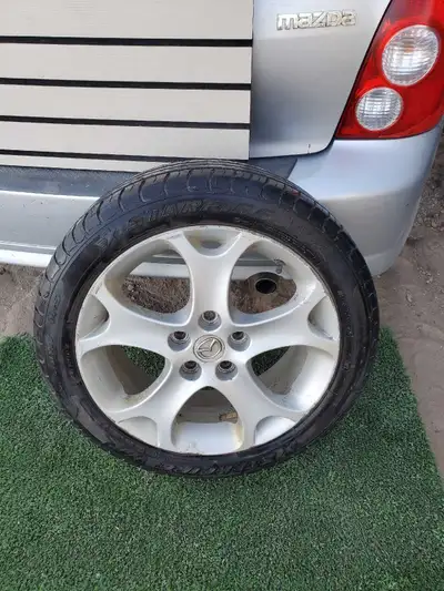 FOR SALE – ( 1 only) Starfire WR 205/55R17 All-Season Tire Mounted on Genuine Mazda OEM 17" Alloy Wh...