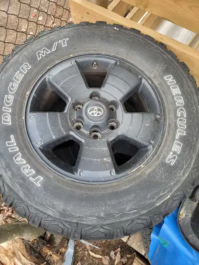 Rims off my sold Tacoma, painted black, minor chips. TPMS need to be replaced, tires are done. Remov...