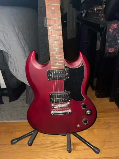 Great condition Epiphone electric guitar used only a handful of times, comes with stand, Vox Pathfin...