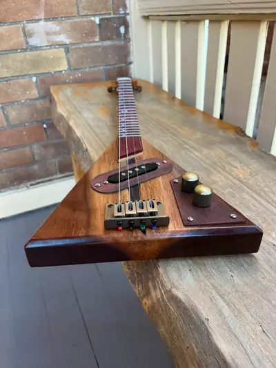 A brand new custom 4-string tenor electric guitar made by a local Canadian luthier. Great for open t...