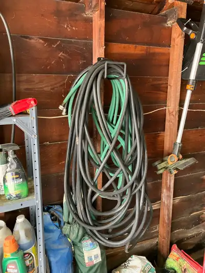  Two 50 foot high-quality rubber hoses , View more