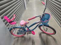 Girls bike with beautiful basket and doll bike seat