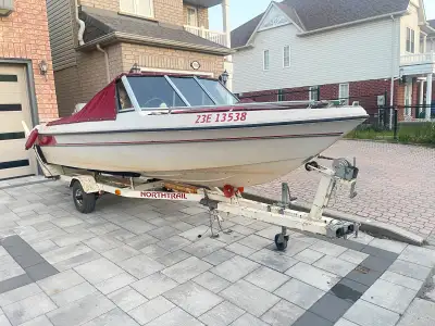 Fair condition, fibre boat. need engine tuneup, working condition, steering little stiff, with two l...