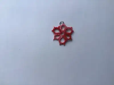 - tatted pendant in variegated thread. - size 3 cm - great to use on clothing, quilts, journals, fab...