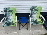  Two beach chairs and a table