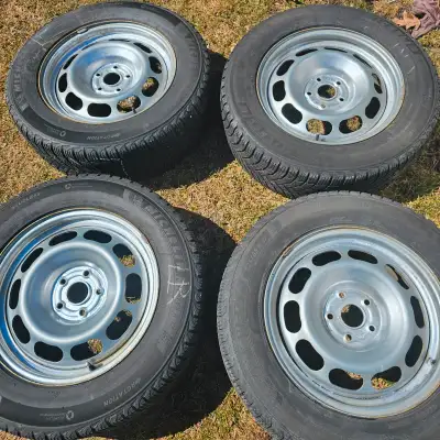 selling four 17 inch Michelin winter tires with steel rims for $700. about 80% of tread remaining. t...