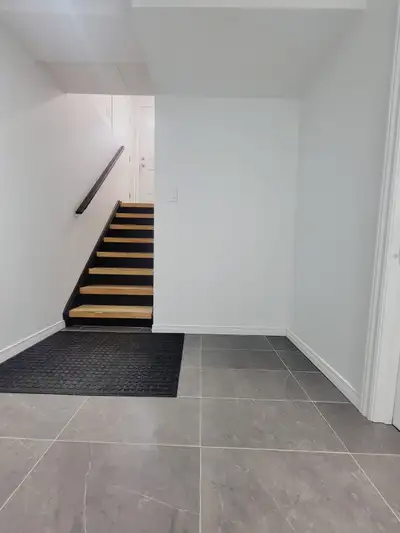 Clean and spacious basement apartment featuring two comfortable bedrooms, a bright living room area,...